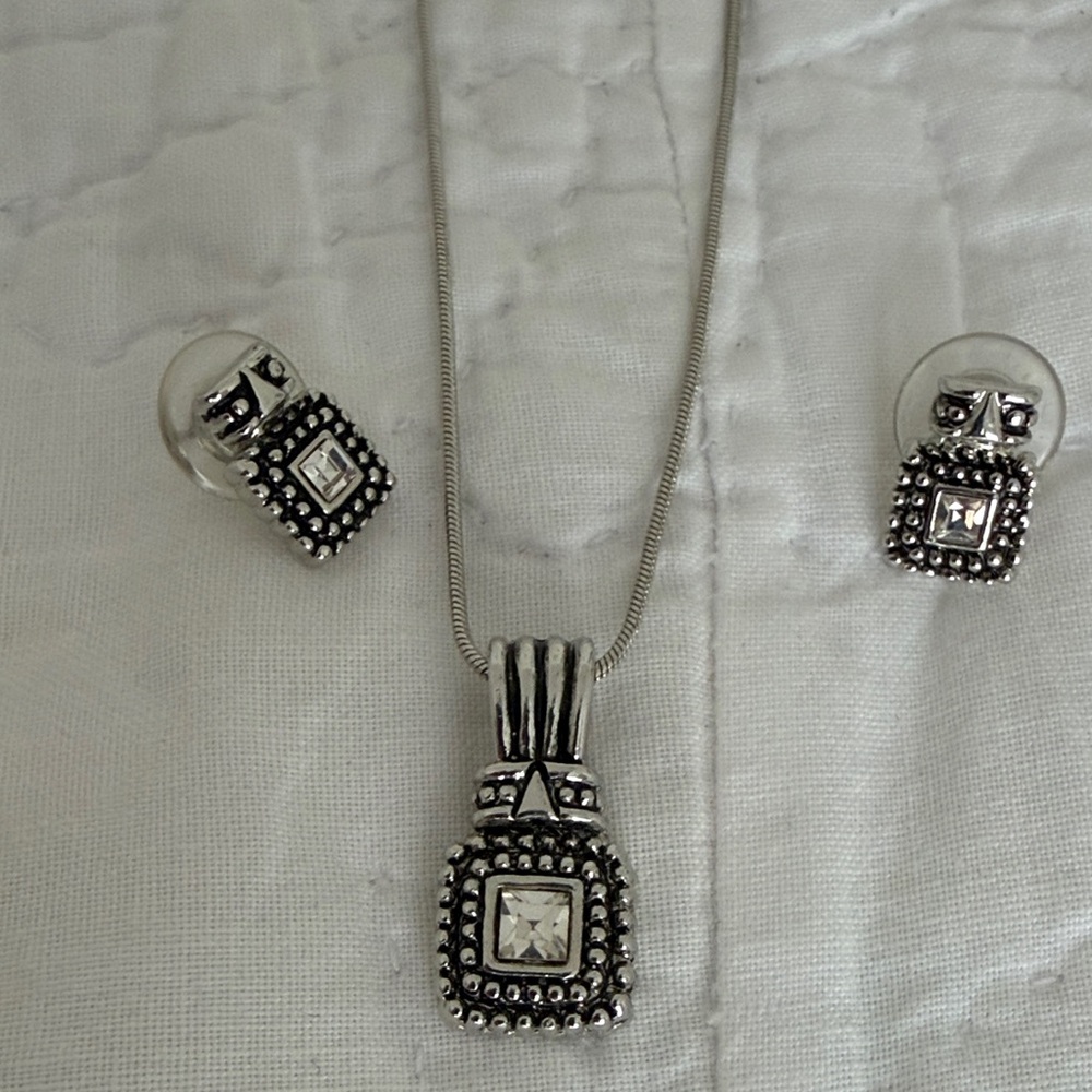 Elegant Silver Pendant and Earring Set
